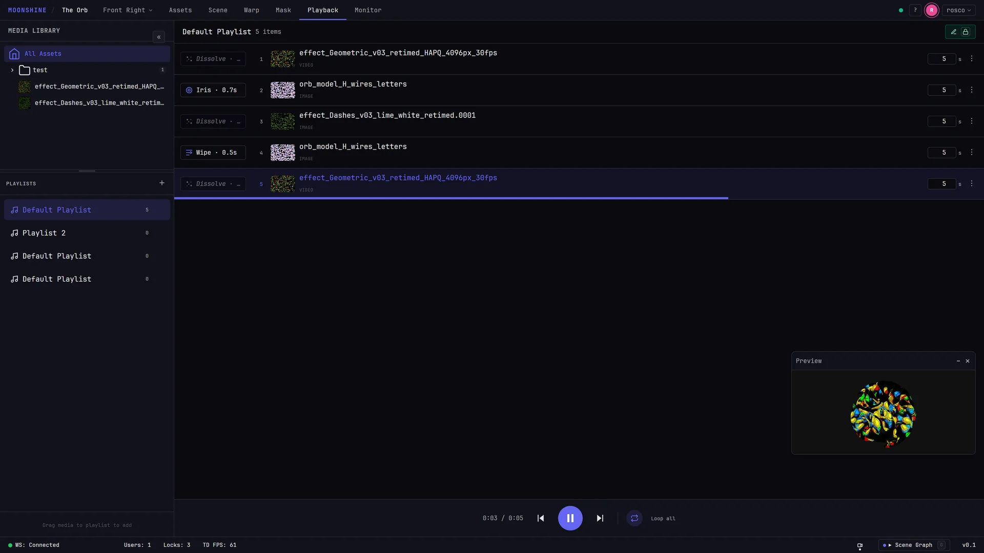 Playback tab: Asset Browser and Playlists in the left sidebar, a populated playlist with transition chips in the center, transport bar along the bottom